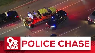 POLICE CHASE COVERAGE Stolen tow truck plows through police and civilian cars in Maryland [upl. by Hui]