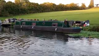 The Grand Union Canal at sunset With two narrowboats sailing by [upl. by Jolenta]