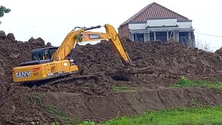 Excavators At Work Digging Dirt On The River Dam Construction [upl. by Llerehs144]