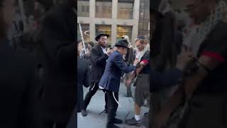 Confused Jewish Palestinian protester puts on Tefillin israel [upl. by Holladay]