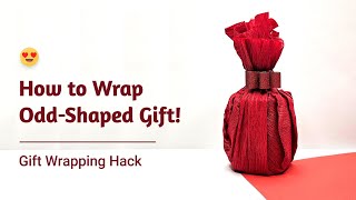 How to Wrap an OddlyShaped 🤩 Difficulttowrap Item giftwrapping [upl. by Schalles]