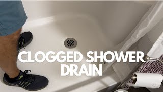 Unclog Your Shower Drain  2 Minute Fix [upl. by Ahseinod]