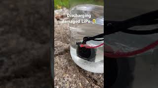 Discharging damaged LiPo battery 4S Tattu RLine 850mAh in salty water fpv 4s fpvdrone crash [upl. by Eenalem]