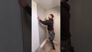 Fitting wet wall panels in a bathroom bathroom carpenter newbuild [upl. by Lettig]