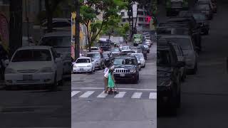 Little girls big heart Guiding elderly across the street shorts [upl. by Anoiek275]