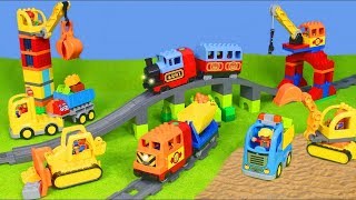 Trenes infantiles LEGO DUPLO PELICULA INFANTIL Construcción pista ferroviaria y estación para niños [upl. by Daffie]