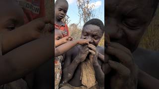 Hadza man feeding his children a favorite Soup middle of nowhere 😄‼️😋food hadzabetribe [upl. by Tierza]