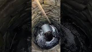 The process of filling deep well water with iron barrels [upl. by Haronid859]