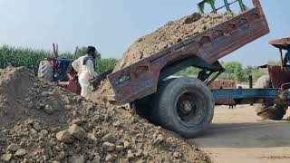 Unloading work on trailer with Tractor [upl. by Cleary]