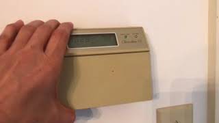 Honeywell chronotherm III thermostat How to change the batteries [upl. by Eyahsal47]