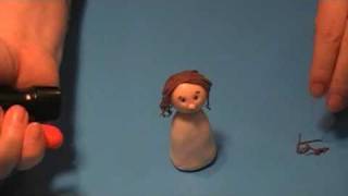 How to add Hair to a Gumpaste Figurine Part One [upl. by Ahseetal]