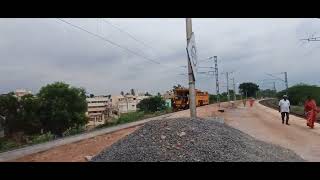 TRACK LAYING amp BALLAST TAMPING MACHINE PASSING UTHTAMAR KOVIL RLY STATION [upl. by Tekla678]