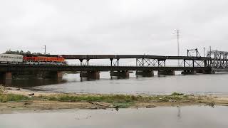 Steel Highway  BNSF 8281 leads the company office car train across the drawbridge at Fort Madison [upl. by Hashimoto97]