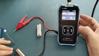 FNIRSI HRM10 Internal Resistance Battery Tester Demo [upl. by Alohs514]