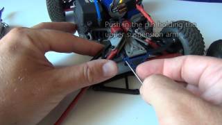 How to replace the rear suspension arms on the mini Slash from Traxxas [upl. by Fesuoy712]