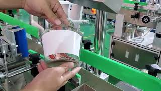 Glass container special self adhesive sticker automatic labeling machine Round bottle labeler [upl. by Notgnilliw]