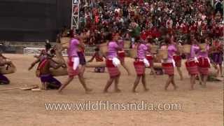 Garo tribal men playing drums while women dance to the beat [upl. by Ardnued359]