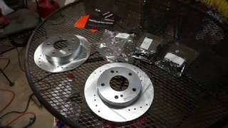 Brakemotive cross drilled and slotted rotors with brake pads review [upl. by Atnohs19]