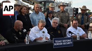 Texas Gov Greg Abbott signs bill that lets police arrest migrants who enter the US illegally [upl. by Lexerd720]