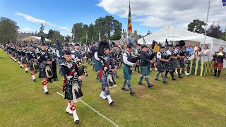 Drum Majors lead the massed Pipes amp Drums salute to Chieftain during 2024 Aboyne Highland Games [upl. by Nehtiek]