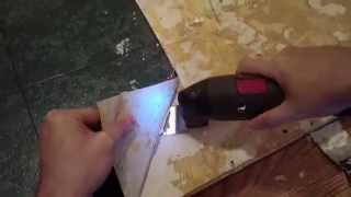 How To Remove Linoleum Or Vinyl Flooring From Wooden Floor Using An Oscillating Multi Tool [upl. by Ianahs]