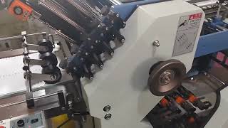 Automatic Pile Feed leaflet Paper Folding Machine  How paper folding machine works [upl. by Brendis]