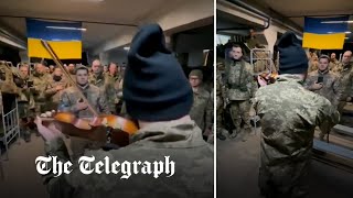 Ukrainian soldier plays national anthem on violin in symbol of hope in war against Russia [upl. by Lleruj673]