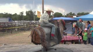 Young Bull Rider JC Mortensen on mechanical bull at Prescott rodeo [upl. by Yanehs]