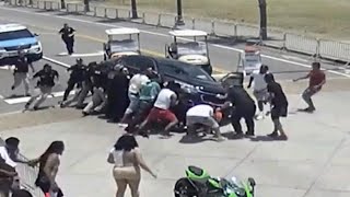 Good Samaritans Race to Lift Car off Motorcyclist [upl. by Eagle653]