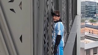 Man Arrested While FreeClimbing Skyscraper in Buenos Aires [upl. by Ylrehs]