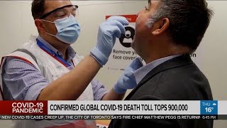 Global COVID19 death toll tops 900000 [upl. by Allain]