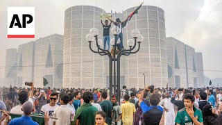 Celebrations in Bangladesh after Prime Minister Sheikh Hasina resigns and flees country [upl. by Procora]