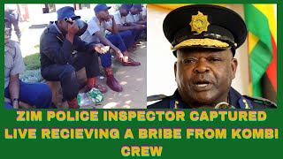 ZIMBABWEAN POLICE INSPECTOR CAPTURED LIVE RECIEVING A BRIBE FROM KOMBI CREW [upl. by Suolhcin117]