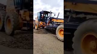 Case motor grader pushing materials [upl. by Sirob]