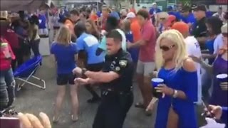 Watch This Police Officer Join Football Fans Dancing To Cupid Shuffle [upl. by Notyrb]