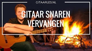 Snaren vervangen van een gitaar [upl. by Garnet]