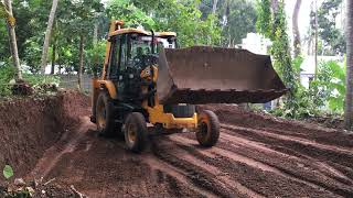 jcb 3dx digging soil and levelling land [upl. by Xonnel147]