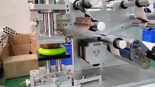 Round self adhesive sticker round bottle cap top side labeling machine labeling labelingmachine [upl. by Peirce]