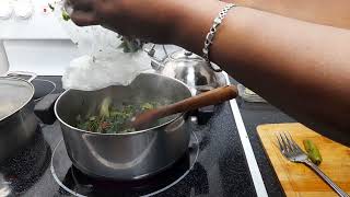 How to make Jamaican Callaloo Rice [upl. by Rettuc345]