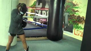 How to Punch the heavy bag for women [upl. by Roselle]