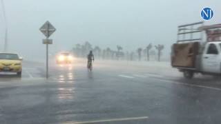 Cyclists riding on A1A caught in weather system over Flagler County [upl. by Assylem]