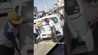 Look at how matatu conductors in Nairobi CBD carried a Suzuki Alto away which was blocking their way [upl. by Dolloff]