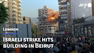 Moment Israeli strike hits building in Beiruts southern suburbs  AFP [upl. by Claudy]