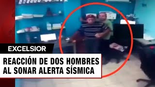 Reacción de dos hombres al sonar Alerta Sísmica en oficina se hace viral [upl. by Grigson]