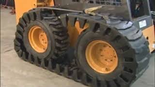 Quick Attach Solideal Skid Steer Over the Tire Track Install [upl. by Ttevy]