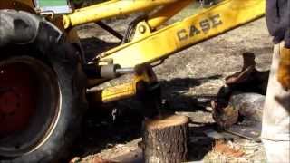 Backhoe Mounted Wood Splitter [upl. by Airebma]