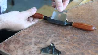 Using a Veritas spokeshave to flush trim walnut edge banding [upl. by Witkin41]