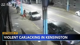 Video captures violent Philadelphia carjacking on Kensington Avenue 2 suspects wanted [upl. by Adahs179]