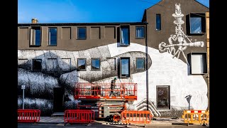 Phlegm artist works on mural at Eye Witness Works [upl. by Rayburn]