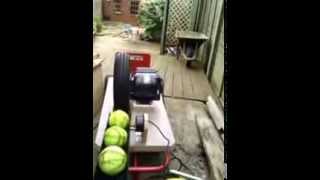 Home made slowpitch softball pitching machine  trial in the garden [upl. by Peedsaj]